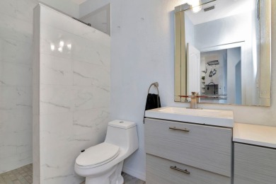 Wake up every day to a condo that faces the water with NO STORM