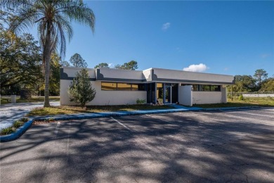 Excellent location! Great stucco retail building divided in 2