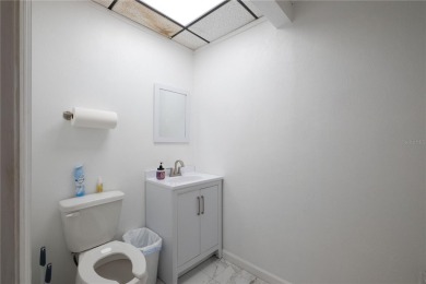 Excellent location! Great stucco retail building divided in 2