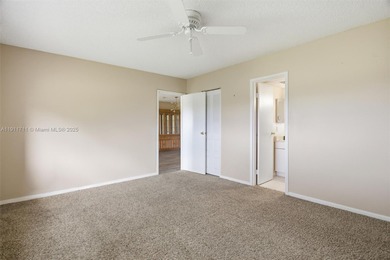 MOTIVATED SELLER! Spacious 2BR/2BA second-floor condo in the