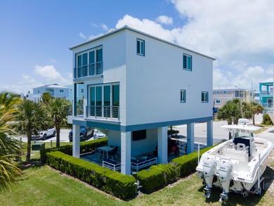 Oceanfront living, elevated. Enjoy expansive, protected views