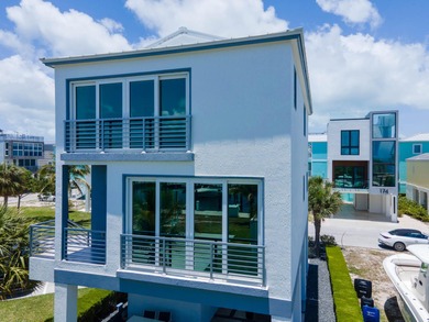 Oceanfront living, elevated. Enjoy expansive, protected views