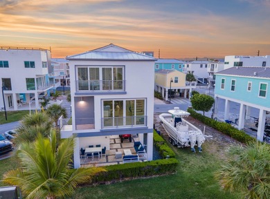 Oceanfront living, elevated. Enjoy expansive, protected views
