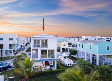 Oceanfront living, elevated. Enjoy expansive, protected views