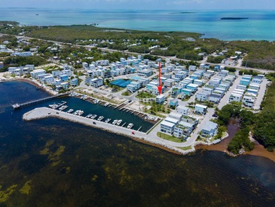 Oceanfront living, elevated. Enjoy expansive, protected views