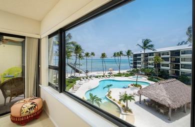 Welcome to Unit #409 at Beacon Reef, an oceanfront gem located