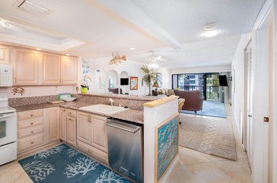 Welcome to Unit #409 at Beacon Reef, an oceanfront gem located