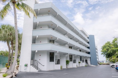 Stunning Bayfront Condo in Moon Bay with Deeded Boat Slip & Boat