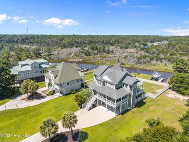 Welcome to this stunning 4-bedroom, 3.5-bath reverse floorplan