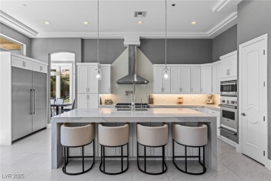 Wake up to panoramic golf course views at this custom home