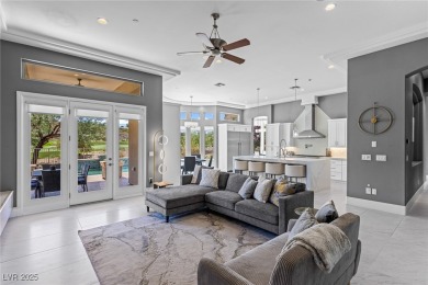 Wake up to panoramic golf course views at this custom home