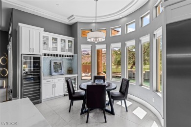 Wake up to panoramic golf course views at this custom home