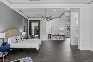 Wake up to panoramic golf course views at this custom home