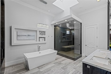 Wake up to panoramic golf course views at this custom home