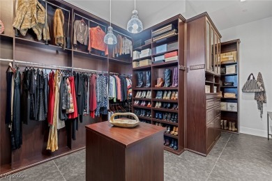 Wake up to panoramic golf course views at this custom home