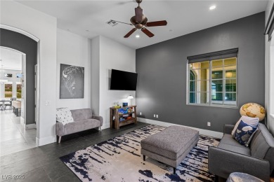 Wake up to panoramic golf course views at this custom home