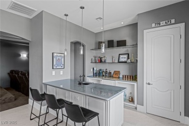 Wake up to panoramic golf course views at this custom home