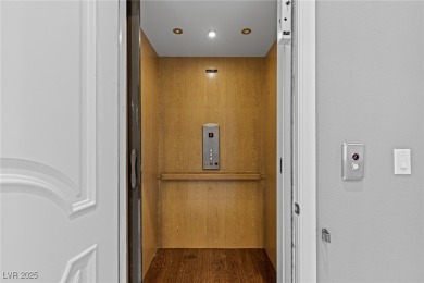 Wake up to panoramic golf course views at this custom home