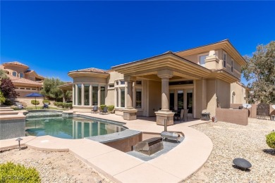 Wake up to panoramic golf course views at this custom home