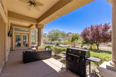 Wake up to panoramic golf course views at this custom home