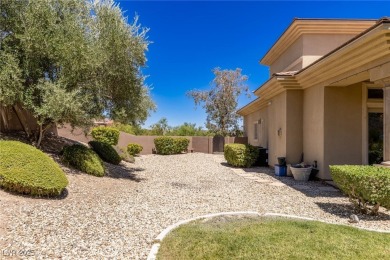 Wake up to panoramic golf course views at this custom home