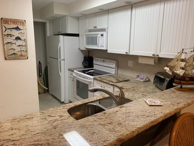 Premier 1 bedroom unit a stunning open water and pool view off