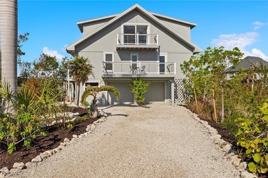This raised 3-bedroom, 2-bath lake-view home in the popular Gulf