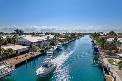 Experience the ease and elegance of true island living in this