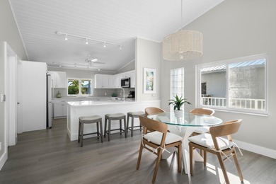 Experience the ease and elegance of true island living in this