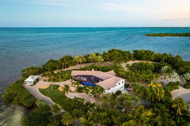 Embrace the rare opportunity to own .87 acres of open-water