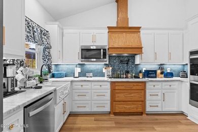 Built in 2023, this 3-bedroom, 3-bath home on East Yacht Drive