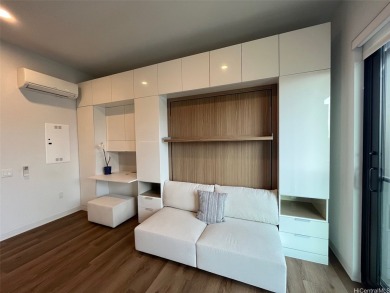 This studio unit is located on the Penthouse-level of the podium
