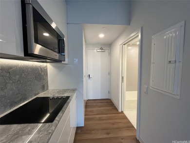 This studio unit is located on the Penthouse-level of the podium