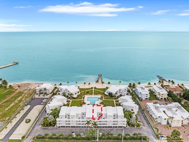 Stunning oceanfront condo with panoramic views of the white-sand