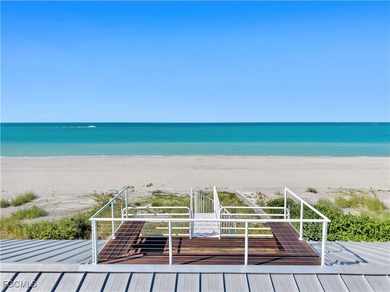 Welcome to a stunning coastal-modern beachfront estate on