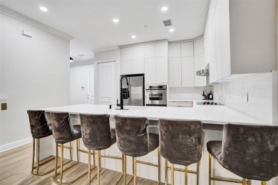 Welcome to 230 NE 69th Circle at Tuscany Village! Situated