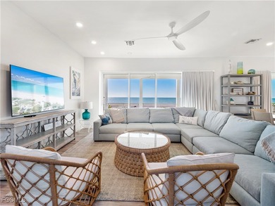 Welcome to a stunning coastal-modern beachfront estate on