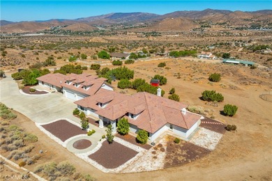 Situated on 9.87 acres, this Acton property showcases a