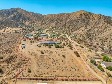 Situated on 9.87 acres, this Acton property showcases a