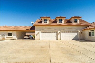 Situated on 9.87 acres, this Acton property showcases a