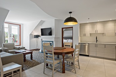 SOMMET-DES-NEIGES--1/4 of a magnificent 2-bedroom unit offering