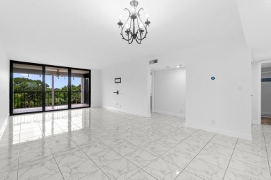 Beautifully renovated home with an amazing lake and golf view in