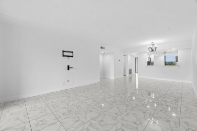 Beautifully renovated home with an amazing lake and golf view in