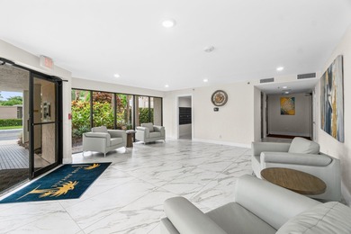 Beautifully renovated home with an amazing lake and golf view in