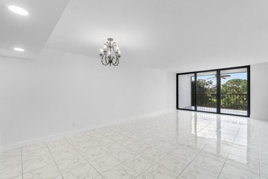 Beautifully renovated home with an amazing lake and golf view in