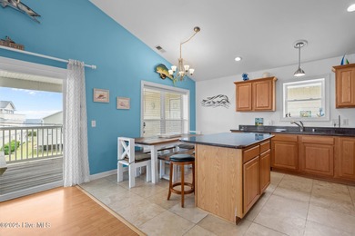 Enjoy coastal living with this rare opportunity to own two