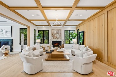 1220 Corsica Drive is a striking new custom estate nestled in