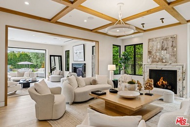 1220 Corsica Drive is a striking new custom estate nestled in