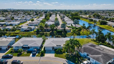 Gorgeous home situated on a corner lot with a lovely water view