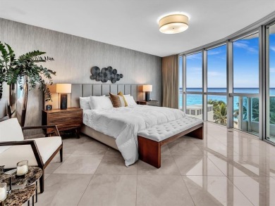 Experience luxury oceanfront living in this renovated 2-bedroom
